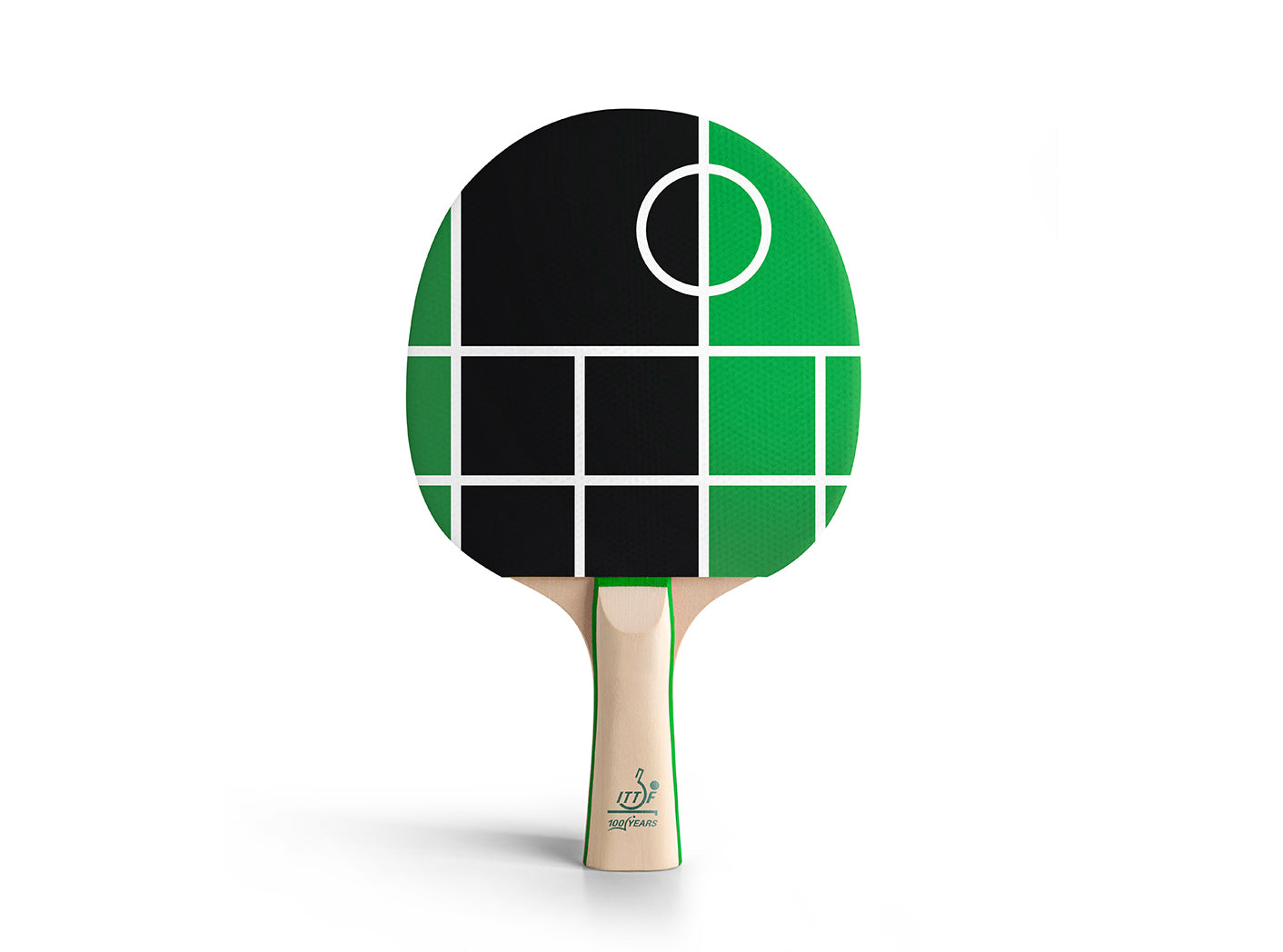 ITTF Centenary table tennis bat with geometric black and green rubber design, white line detailing and natural wood handle on white background.