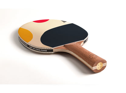 Table tennis paddle with a colorful design on a white background