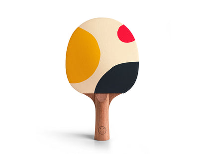 Colorful ping pong paddle with a wooden handle on a white background