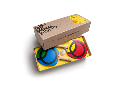 ArtNet Box by Art Ping Pong with colourful paddles on a white background
