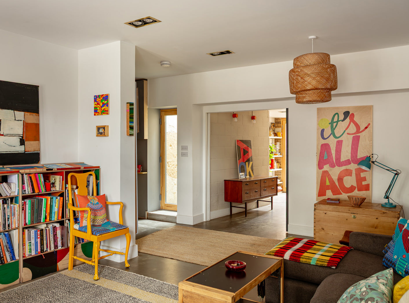 It’s All Ace ArtTable by Art of Ping Pong shown in a colourful modern living room interior
