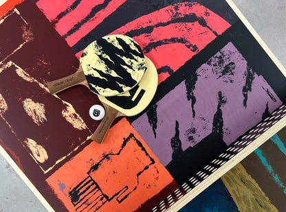 Table tennis paddles with a colourful abstract design by Jamel Armand
