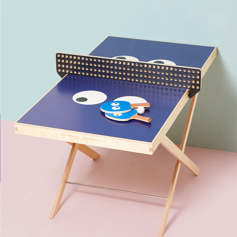 Art of Ping Pong And The Conran Shop ArtTable with two bats and a ball