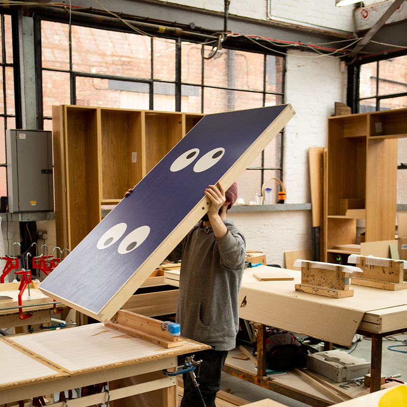 The Conran Shop ArtTable in production in woodwork studio. Being Carried